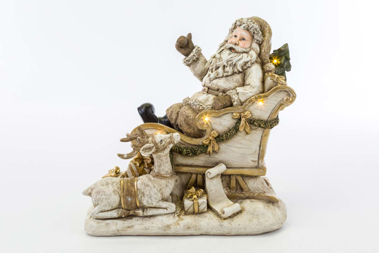 Immagine di BABBO NATALE RESINA CON SLITTA BEIGE CON LED H 25