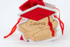 Immagine di PORTA SACCHETTO LEGNO LAUREA CONFEZIONE 48 PEZZI