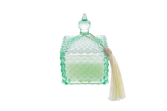 Immagine di Candela profumata col.verde 9,5x9,5xh.14cm c/shopper le stelle bomboniere 56245